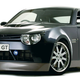 Illustration for article titled The First Modern Hybrid Sports Car Had A Tiny V10 And Never Happened